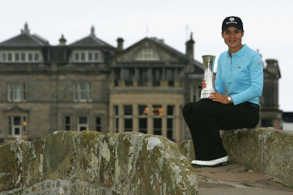 Lorena Ochoa poses with the AIG Women's Open trophy on St Andrews' famous Swilcan Bridge